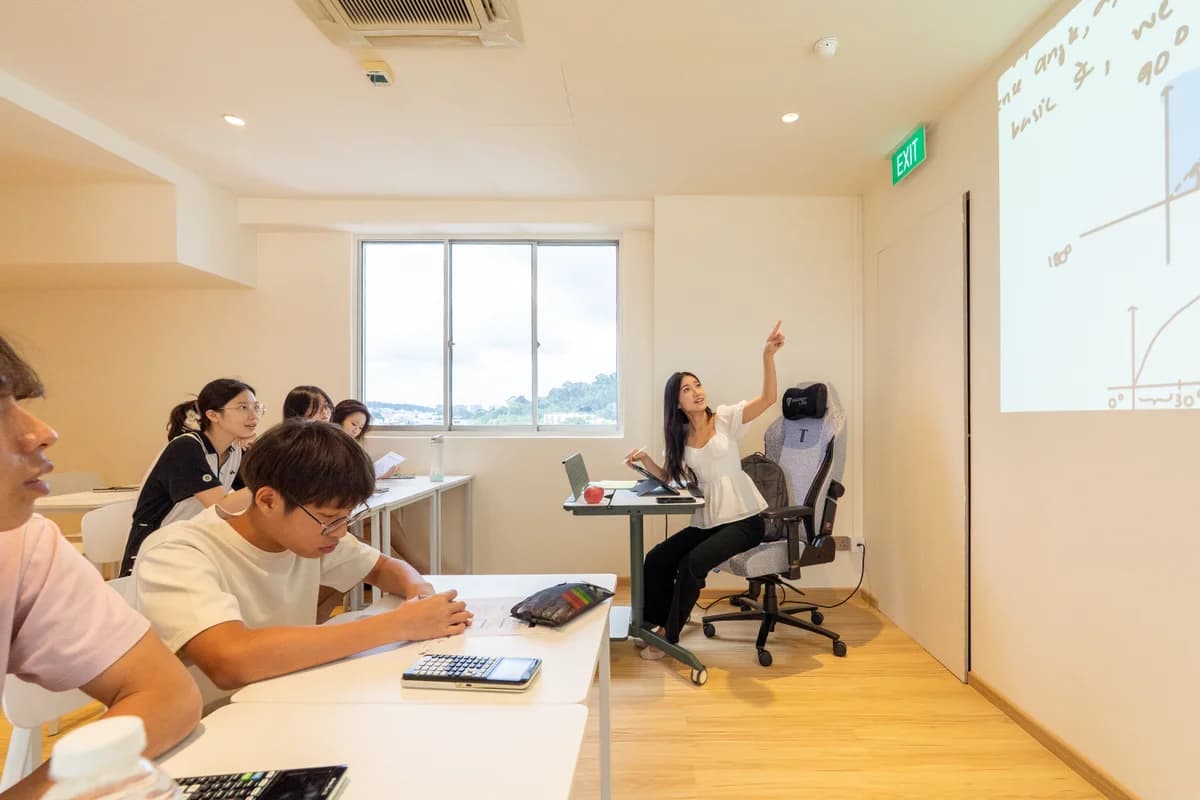 Students learning math at desks in class